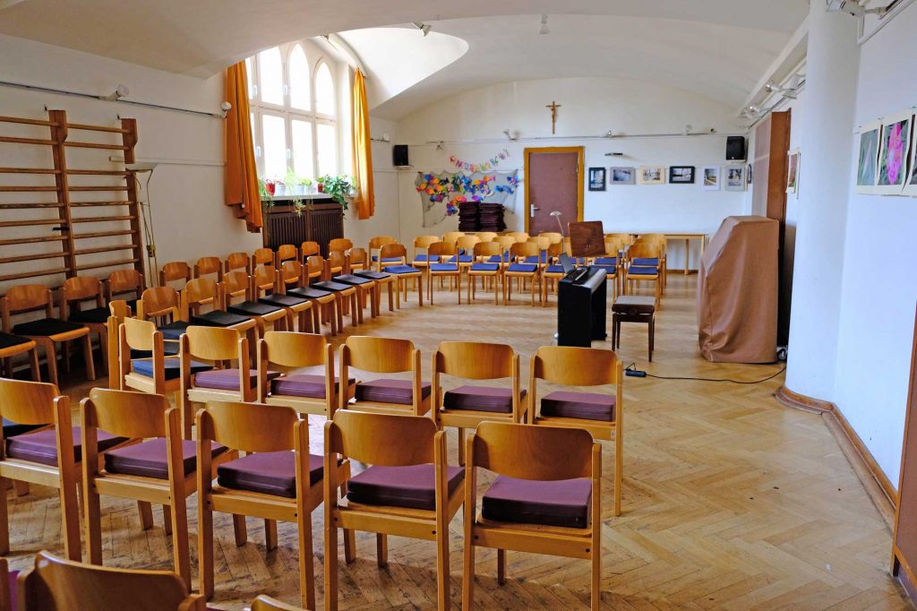 In the parish hall the church choir rehearses 